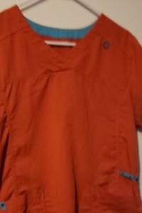 Orange scrub top